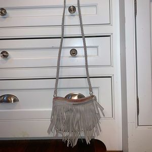 Fringed shoulder bag with braided strap